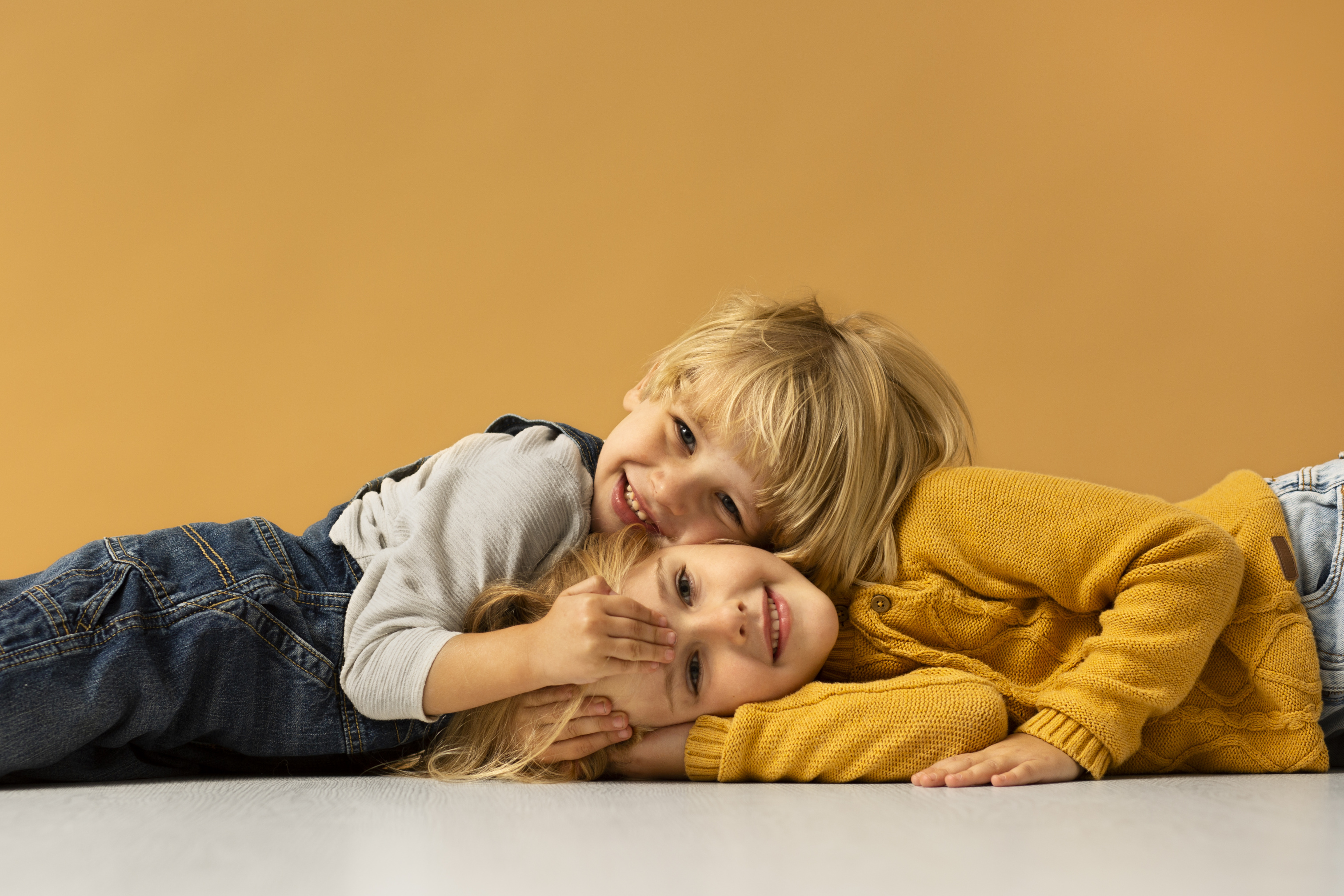 medium-shot-smiley-kids-posing-indoors.jpg